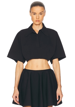 ALAÃA ALAÎªA Crop Polo Top in Noir Alaia - Black. Size 40 (also in 36).