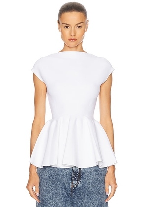 ALAÃA Peplum Top in Blanc - White. Size 38 (also in 40, 34).