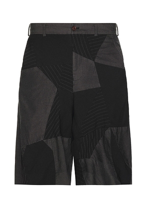 COMME des GARCONS BLACK Gabardine Pachwork Garment Treated Shorts in Black - Black. Size XL (also in L).
