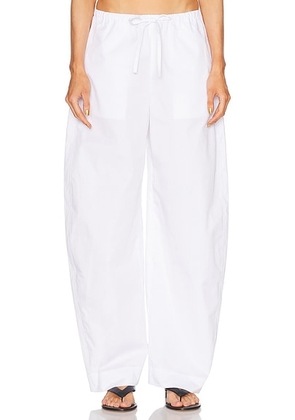 EAVES Lana Barrel Leg Pant in White - White. Size M (also in L, XL).