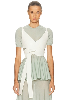 ALAÃA ALAÎªA Cross Top in Blanc Nacre - White. Size 36 (also in 38, 34).