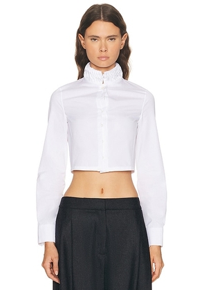 ALAÃA ALAÎªA Trimmed Shirt in Blanc - White. Size 40 (also in 36).