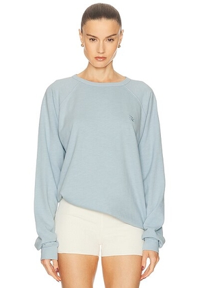Eterne Oversized Lightweight French Terry Raglan Sweatshirt in Dusty Blue - Baby Blue. Size M (also in L, S, XL).
