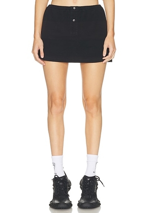 Alexander Wang Mini Deconstructed Polo Skort in Black Overdyed Stripe - Black. Size XS (also in M, L).