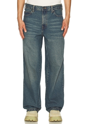 Dickies Hilham Denim Jean in Khaki Tinted Blue - Blue. Size 30x32 (also in 28x32, 34x32).