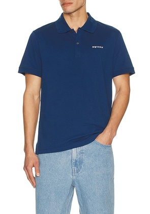 McQueen Logo Embroidered Polo in Royal Blue - Royal. Size M (also in S, L, XL/1X, XXL/2X).
