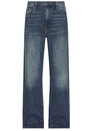 SIMKHAI Poe Wide Leg Jeans in Vintage Wash - Blue. Size 30 (also in 31, 36).