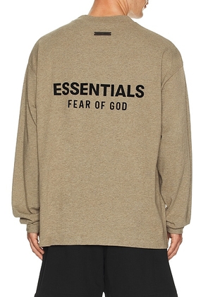 Fear of God ESSENTIALS Jersey Long Sleeve T-Shirt in Heather Gray - Grey. Size M (also in L, XL/1X, XXL/2X).