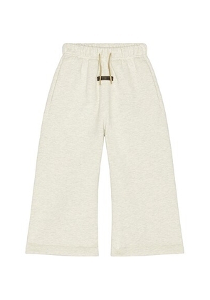 Fear of God ESSENTIALS Kids Flare Sweatpant in Oatmeal Heather - Grey. Size 4/5 (also in 2/3, 6/7).