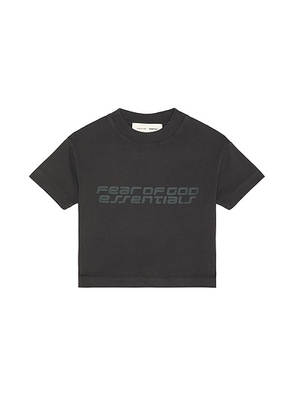 Fear of God ESSENTIALS Kids Short Sleeve Tee in Vintage Black - Black. Size 4/5 (also in 2/3, 6/7).