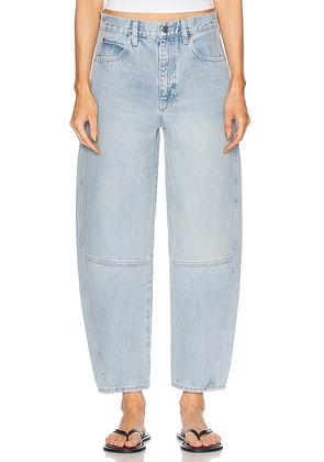 FRAME The Twisted Jeans in Never - Blue. Size 29 (also in ).