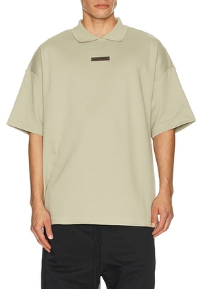 Fear of God ESSENTIALS 90s Fit Pique Polo in Abbey Stone - Grey. Size M (also in L, XL/1X).