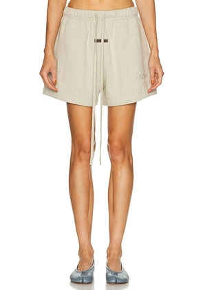 Fear of God ESSENTIALS Fleece Soccer Short in Heather Stone - Grey. Size M (also in XS, S, L).