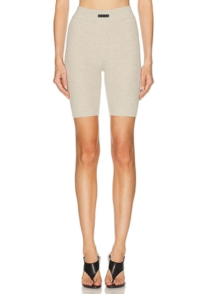 Fear of God ESSENTIALS Biker Short in Timber - Beige. Size M (also in XS, S, L).