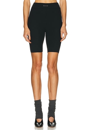 Fear of God ESSENTIALS Soft Rib Biker Short in Black - Black. Size S (also in M).