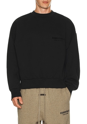 Fear of God ESSENTIALS Classic Crewneck Sweatshirt in Vintage Black - Black. Size M (also in L, XL/1X).