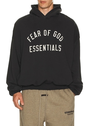 Fear of God ESSENTIALS 90'S Fit Hoodie in Vintage Black - Black. Size XXL/2X (also in ).