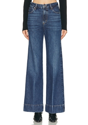 FRAME The Slice Flare Jeans in Headliner - Blue. Size 28 (also in 25, 27, 29, 30, 31, 33, 34).