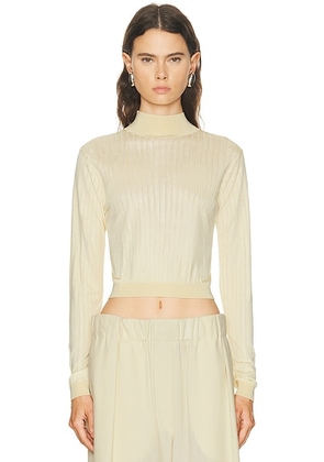 FRAME Crop Fitted Turtleneck in Butter - Lemon. Size M (also in XS, S, L, XL).