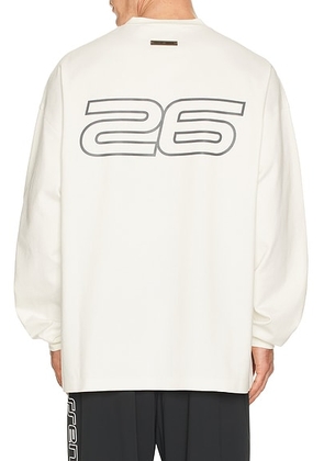Fear of God ESSENTIALS 90'S Long Sleeve Tee in Ivory - White. Size M (also in XS, S, L, XL/1X, XXL/2X).