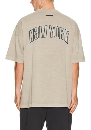 Fear of God ESSENTIALS 90'S Short Sleeve Tee in Smoke Grey - Grey. Size M (also in XS, S, L, XL/1X, XXL/2X).