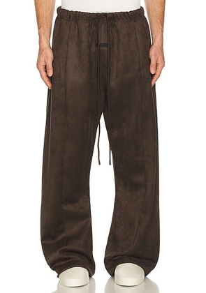 Fear of God ESSENTIALS Flare Pant in Brown - Brown. Size M (also in XS, L, XL/1X).