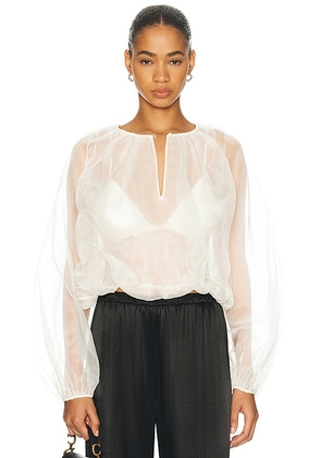 FRAME The Sheer Balloon Blouse in Cream - Cream. Size L (also in S, XS, M).