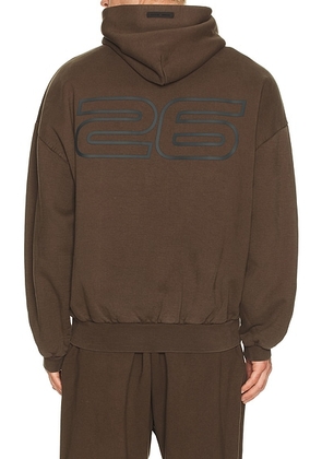 Fear of God ESSENTIALS 90'S Hoodie in Brown - Brown. Size M (also in XS, S, L, XL/1X, XXL/2X).