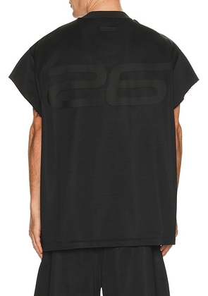 Fear of God ESSENTIALS 90'S Muscle Tee in Vintage Black - Black. Size S (also in XS, M, L, XL/1X, XXL/2X).