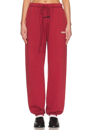 Fear of God ESSENTIALS Classic Sweatpant in Crimson - Red. Size M (also in XS, S, L, XL).