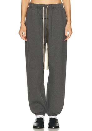 Fear of God ESSENTIALS Classic Sweatpant in Charcoal Heather - Charcoal. Size M (also in XS, S, L).