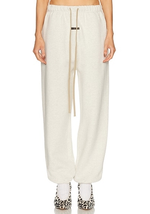Fear of God ESSENTIALS Classic Sweatpant in Oatmeal Heather - Light Grey. Size M (also in XS, S, L, XL).