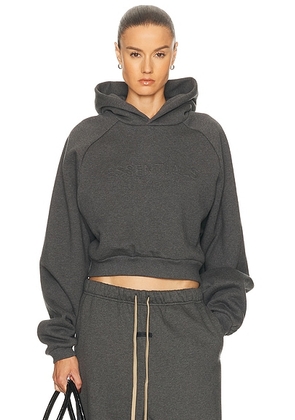 Fear of God ESSENTIALS 90's Raglan Hoodie in Charcoal Heather - Charcoal. Size M (also in L, S, XL, XS, XXS).