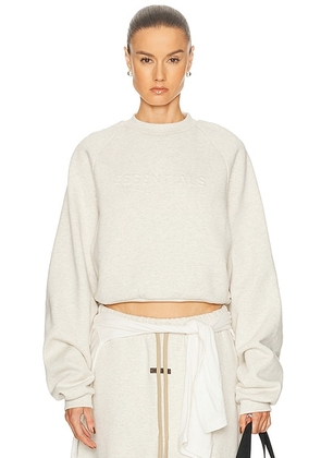 Fear of God ESSENTIALS 90's Raglan Sweatshirt in Oatmeal Heather - Light Grey. Size M (also in L, S, XL, XS).