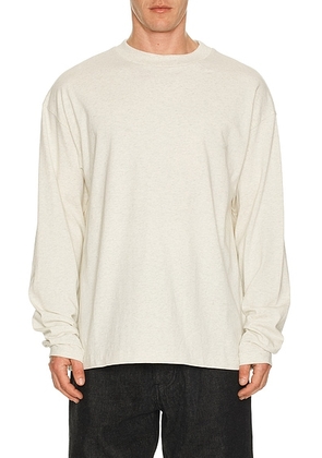 Fear of God ESSENTIALS Classic Long Sleeve Tee in Oatmeal Heather - Grey. Size M (also in XS, S, L, XL/1X, XXL/2X).