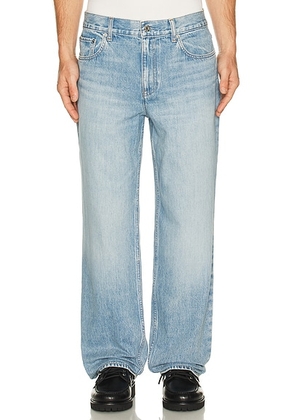 Helmut Lang Wardrobe Jean in Vintage Blue Wash - Blue. Size 30 (also in 31, 33, 34, 36).