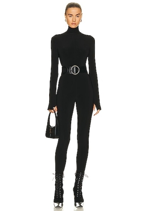 Norma Kamali Long Sleeve Turtleneck Catsuit with Footie in Black - Black. Size M (also in XS, S, L, XL).