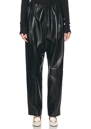 KHAITE Trenton Pant in Black - Black. Size M (also in ).