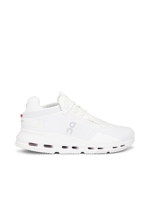 On Cloudnova 2 in All White - White. Size 11 (also in 10, 10.5, 11.5, 12, 12.5, 13, 7, 7.5, 8, 8.5, 9, 9.5).