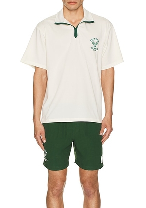 Oyster Tennis Club On Court & Off Court Polo in Vintage White - White. Size M (also in L, XL/1X).