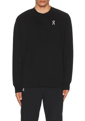 On Club Long-T in Black - Black. Size L (also in M, XL/1X).
