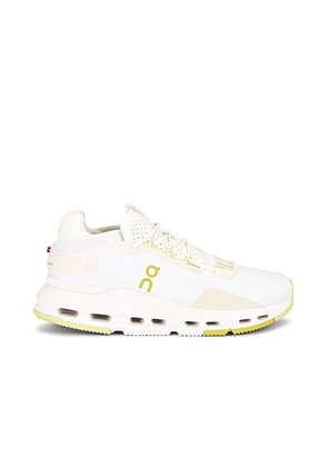 On Cloudnova 2 in White & Limelight - White. Size 11 (also in 10, 11.5, 12, 9.5).