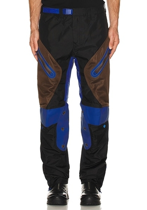 Kiko Kostadinov Moto Pants in Black Rinse - Black. Size M (also in L, XL/1X).