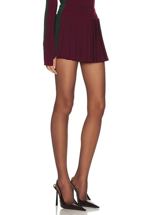 Norma Kamali Side Stripe Pleated Pickleball Skirt in Plum & Dark Emerald - Burgundy. Size S (also in XS, M, L).