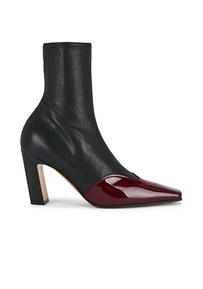 KHAITE Nevada Ankle Stretch Boot in Black & Oxblood - Black. Size 39 (also in 37, 39.5, 40).