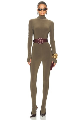 Norma Kamali Long Sleeve Slim Fit Turtleneck Footie Catsuit in Bark - Chocolate. Size S (also in XS, L).