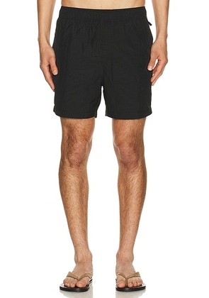 Onia Nylon Crinkle 5 Swim Trunk in Black - Black. Size L (also in S, M, XL/1X).