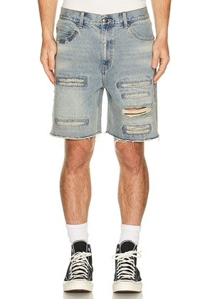 Midnight Rodeo Distressed Denim Shorts in Light Blue Wash - Blue. Size 30 (also in 32, 34, 36).