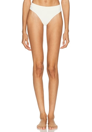 LDMA Low Hide Seamless Thong in Cream - Cream. Size M (also in XS, S, L).