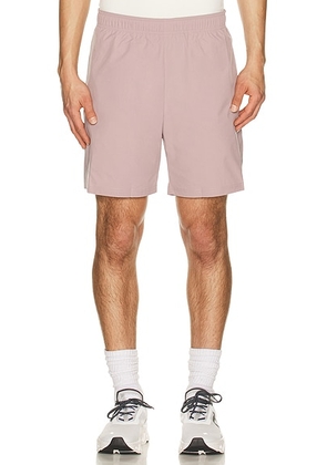 On 7 Core Shorts in Heron - Mauve. Size M (also in XL/1X).